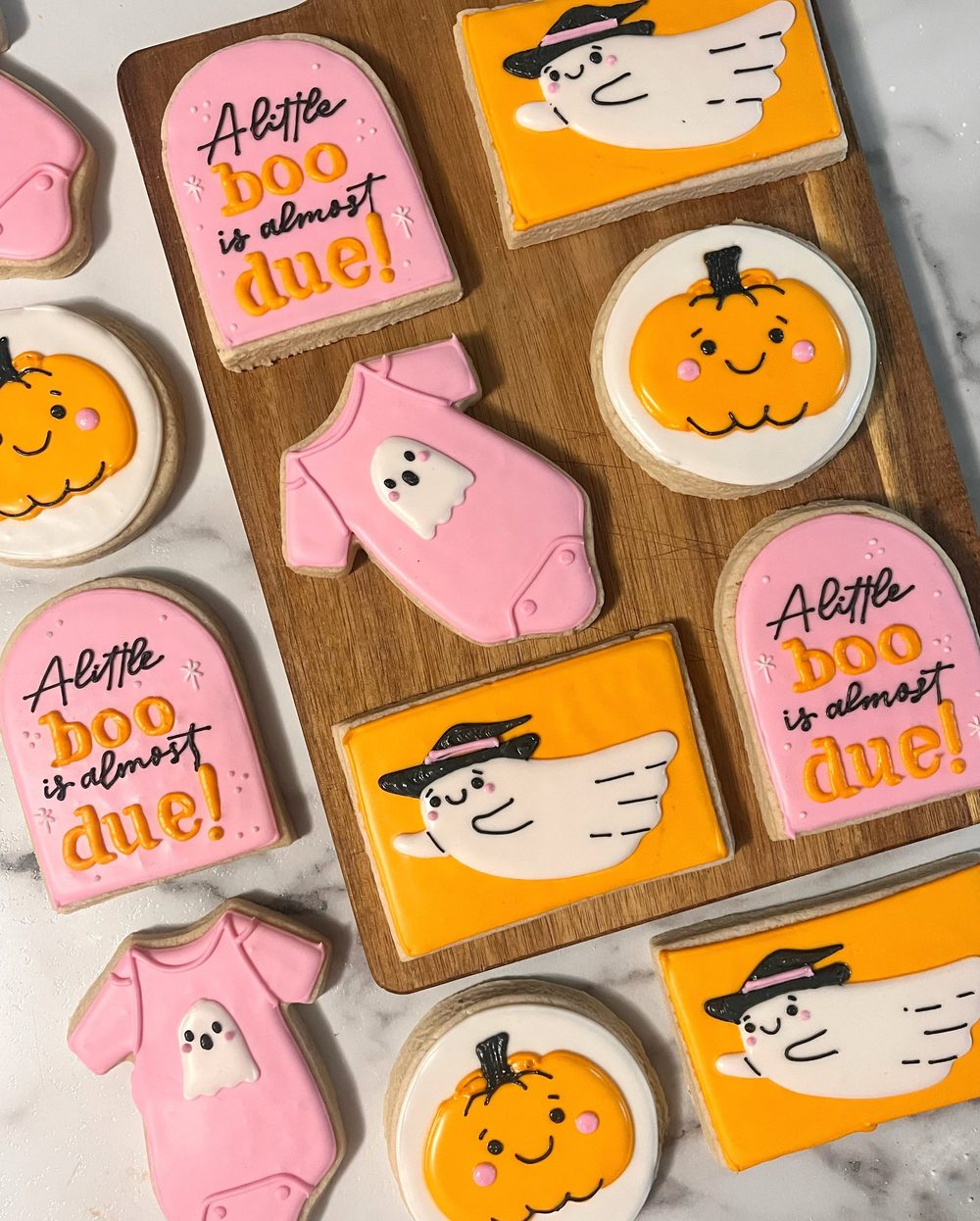 Halloween baby shower cookies: ghosts, pumpkins, onesies and a little boo is almost due