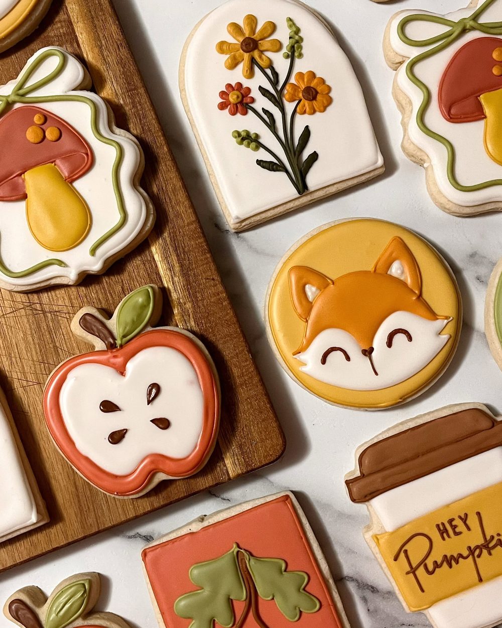 Close-up of fox, mushroom and apple fall cookies